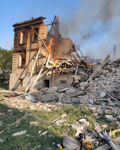 Debris from a partially collapsed building that was hit by shelling in the village of Bilohorivka, Luhansk region, on Sunday. Reuters