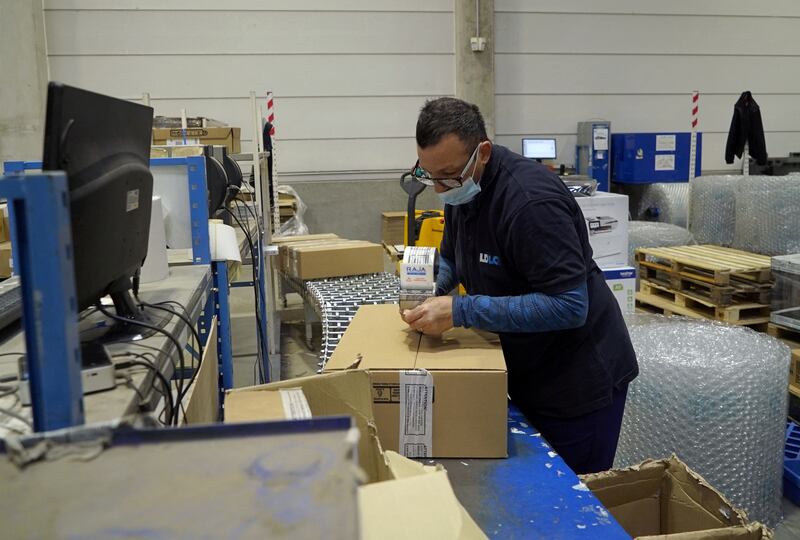 A logistics co-ordinator works at one of LDLC computer hardware retailer's logistics warehouse in Saint-Quentin-Fallavier near Lyon, France. Reuters