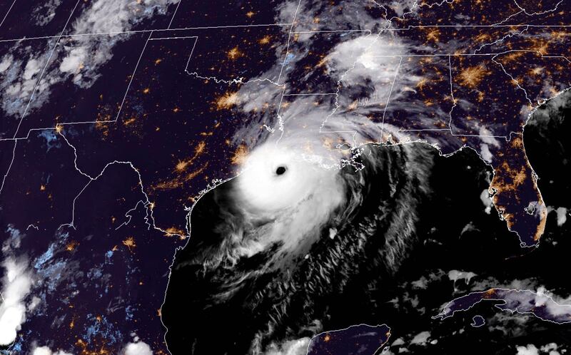 A RAMMB/NOAA satellite image shows Hurricane Laura reaching the coasts of Louisana and Texas. AFP