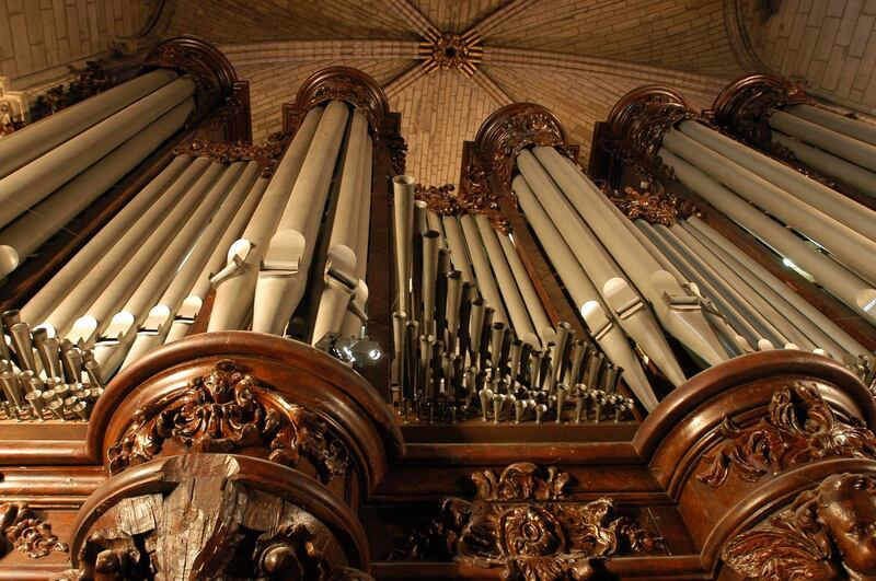 (FILES) This file photo taken on February 1, 2004 shows the organ of Notre Dame de Paris Cathedral, one of the most famous in the World.  
 Paris was struck in its very heart as flames devoured the roof of Notre-Dame cathedral, causing a spire to collapse and raising fears over the future of the nearly millenium old building and its precious artworks. Around 400 firefighters battled through the night, declaring only at around 10 am on April 16 that the fire had finally been extinguished but French Culture minister warned that the structure remained unstable and that no one had yet been able to fully inspect the extent of the fire and water damage inside. the organ appeared to have been "badly damaged" as had many paintings and frescos.
  / AFP / STEPHANE DE SAKUTIN
