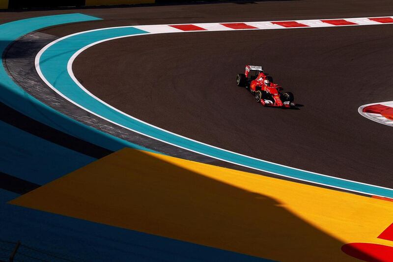 German Sebastian Vettel, of Ferrari, corners during the practice session on Yas Marina Circuit on Friday. Getty Images 