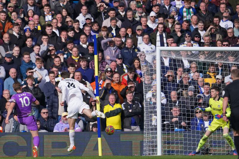 Tottenham Hotspur's Harry Kane, left, scores against Leeds United at Elland Road on Saturday. AFP