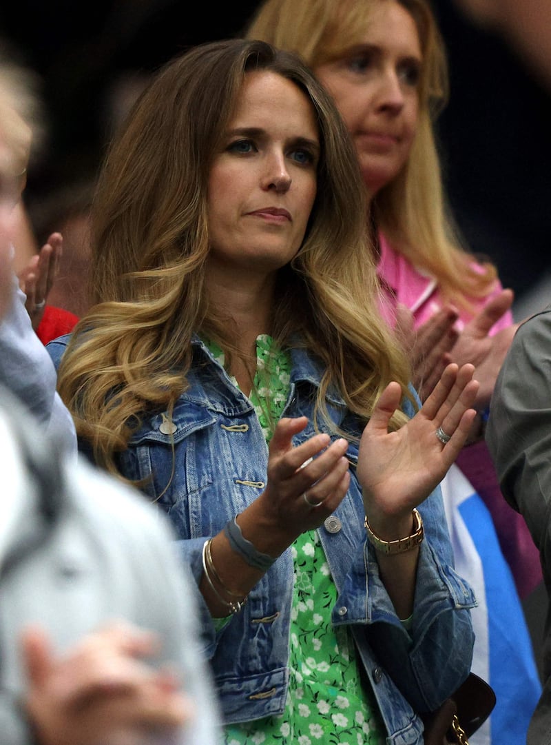 Kim Sears, partner of Britain's Andy Murray, applauds after his defeat.