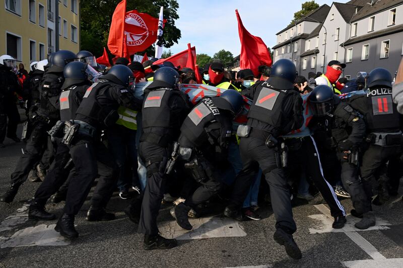 Police block protesters near the far-right Alternative for Germany's convention in Essen. Reuters