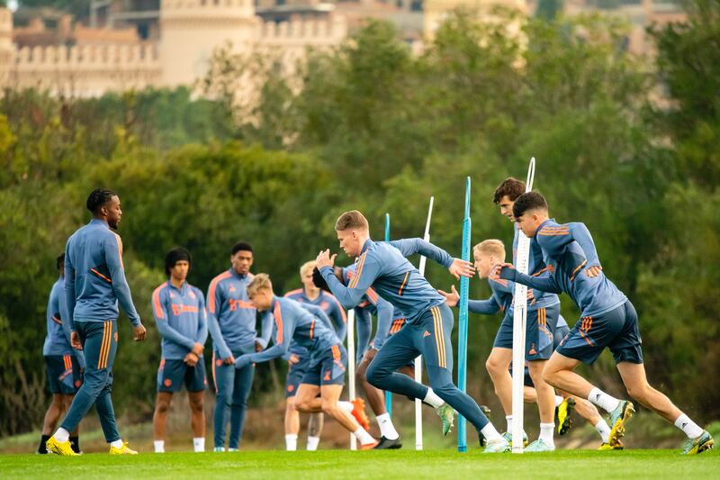 Scott McTominay leads the sprint. 