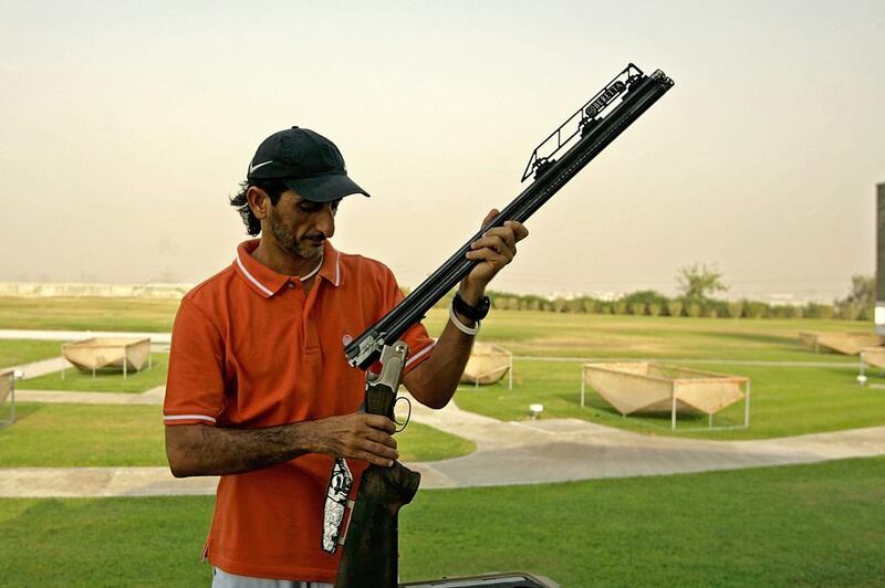 UAe Olympic shooting gold medalist Sheikh Ahmed bin Hasher has decided to start a shooting academy to 'give back to the country' by developing future Emirati Olympic shooting stars. Marwan Naamani / AFP

