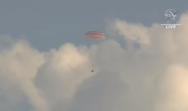 The capsule parachutes in to land in Kazakhstan. Photo: Nasa