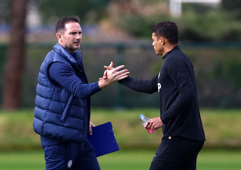 Soccer Football - Champions League - Chelsea Training - Cobham Training Centre, Cobham, Britain - April 17, 2023 Chelsea manager Frank Lampard with Thiago Silva during training Action Images via Reuters / Matthew Childs