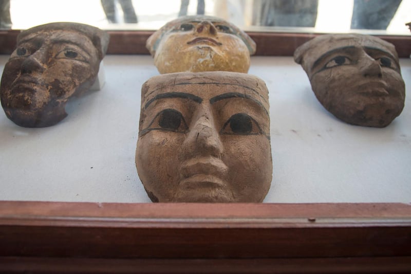 Pharaonic masks are displayed after they were excavated in Saqqara, south of Cairo, Egypt.  EPA