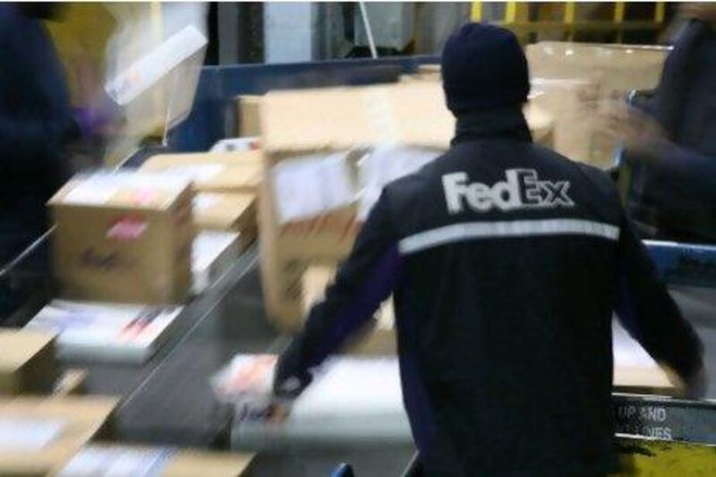 What makes them great: Fed Ex's P-S-P or "people-service-profit" philosophy guides all of their efforts. (AP Photo/Mark Lennihan)