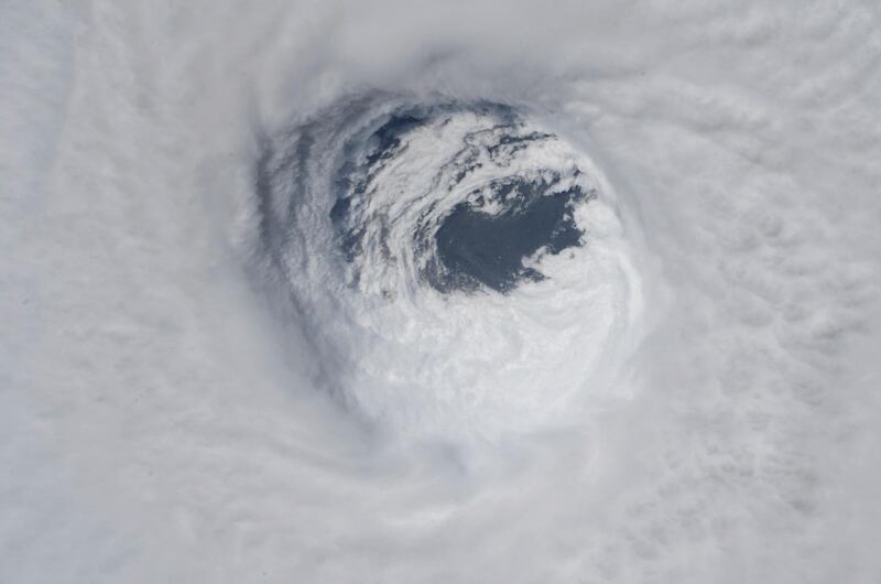 This photo made available by NASA shows they eye of Hurricane Michael, as seen from the International Space Station. AP