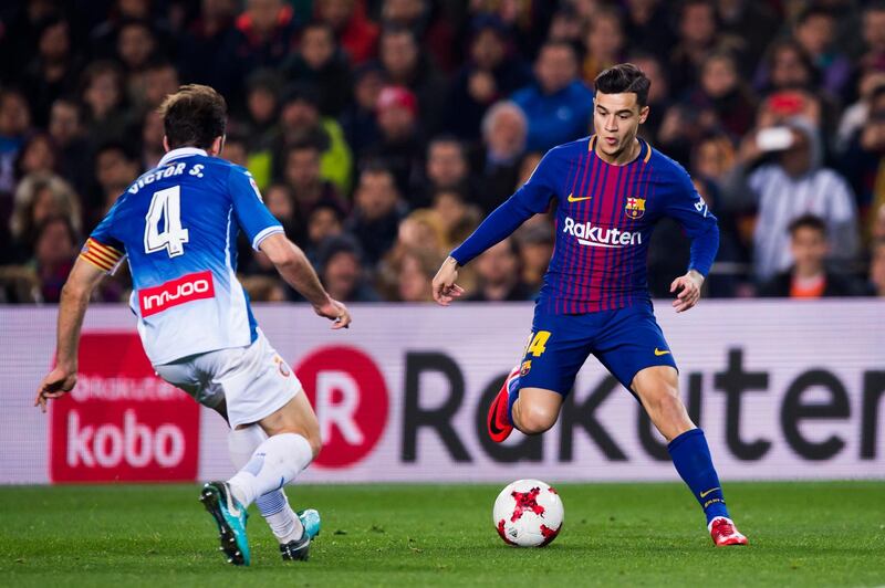 BARCELONA, SPAIN - JANUARY 25:  Philippe Coutinho of FC Barcelona dribbles Victor Sanchez of RCD Espanyol during the Spanish Copa del Rey Quarter Final Second Leg match between FC Barcelona and RCD Espanyol at Camp Nou stadium at Camp Nou on January 25, 2018 in Barcelona, Spain.  (Photo by Alex Caparros/Getty Images)