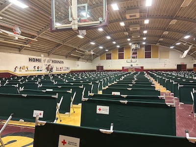 The basketball court at Bassett Middle School will become a temporary shelter for migrants in El Paso, officials said. Jihan Abdalla / The National