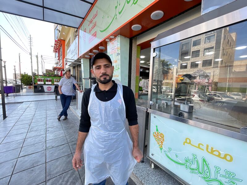 A Syrian refugee who work at a falafel and shawarma shop in the Yasmin-Badr neighbourhood of Amman. All photos: Khaled Yacoub Oweis / The National