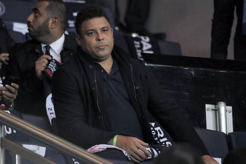 Brazilian football legend Ronaldo attends the Champions League match between PSG and Real Madrid on Wednesday night in Paris. Thomas Samson / AFP
