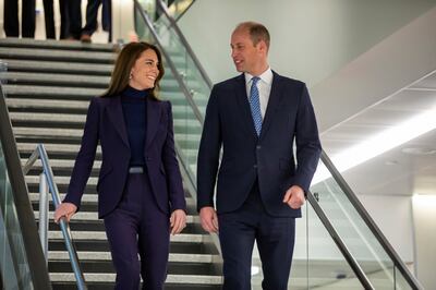 In co-ordinated suits, Prince William and his wife Kate arrive in Boston for a three-day visit, their first trip to the US in eight years. AP