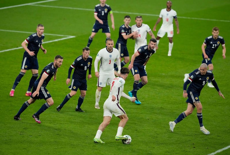 England substitute Jack Grealish attempts to find his through the Scottish defence. Reuters