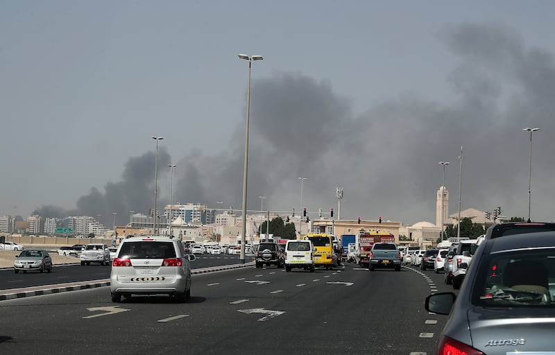 Black smoke rising from the fire in Sharjah, on the border with Dubai.