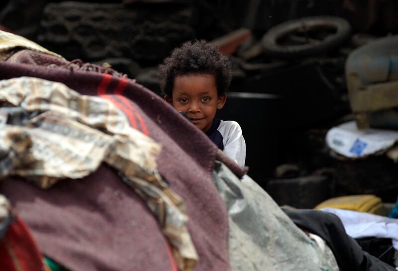 A 'Muhamasheen' child outside a makeshift tent in the slums of Sanaa. AFP