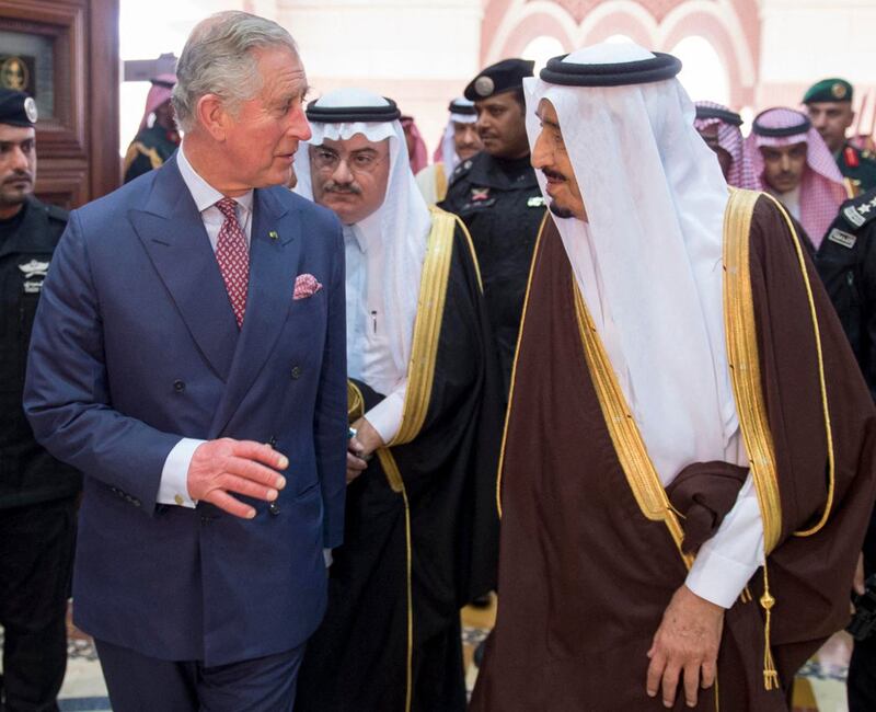 Prince Charles, as he was at the time, speaks to Saudi King Salman bin Abdulaziz Al Saud during a visit to the kingdom in 2015. AFP