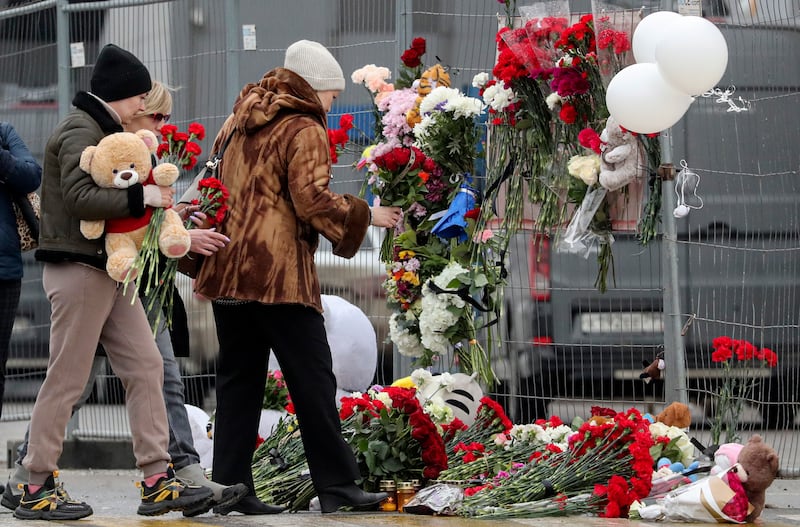 Mr Putin condemned the massacre as a 'barbaric terrorist act'. EPA