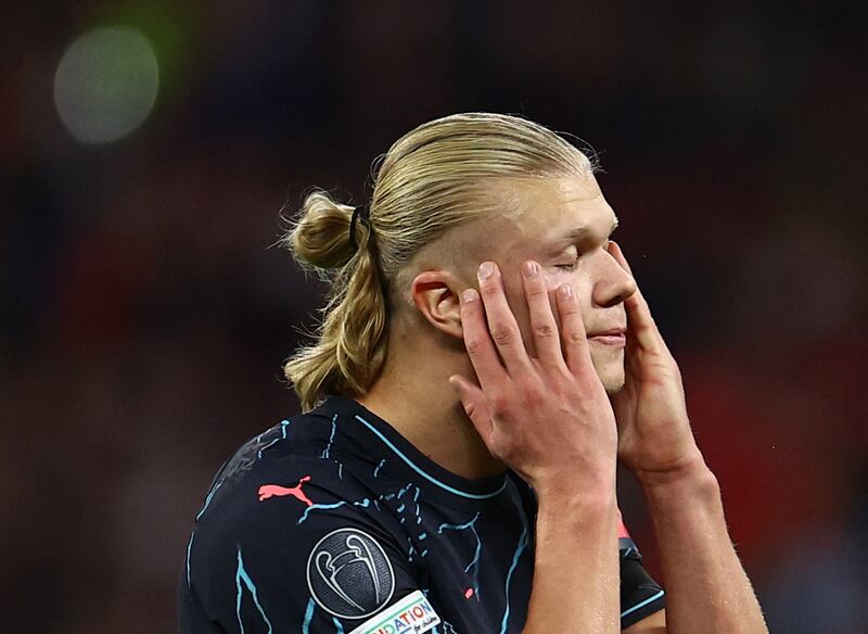 Manchester City's Erling Haaland reacts after missing a chance against RB Leipzig. Reuters