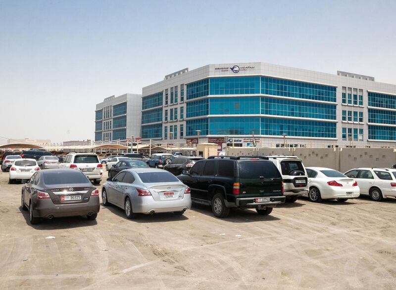 Abu Dhabi, U.A.E., August 16 , 2018. Sand parking lot beside the Khalifa City  Post Office.
Section:  NA
Reporter:  Victor Besa / The National
Section:  NA
Reporter: