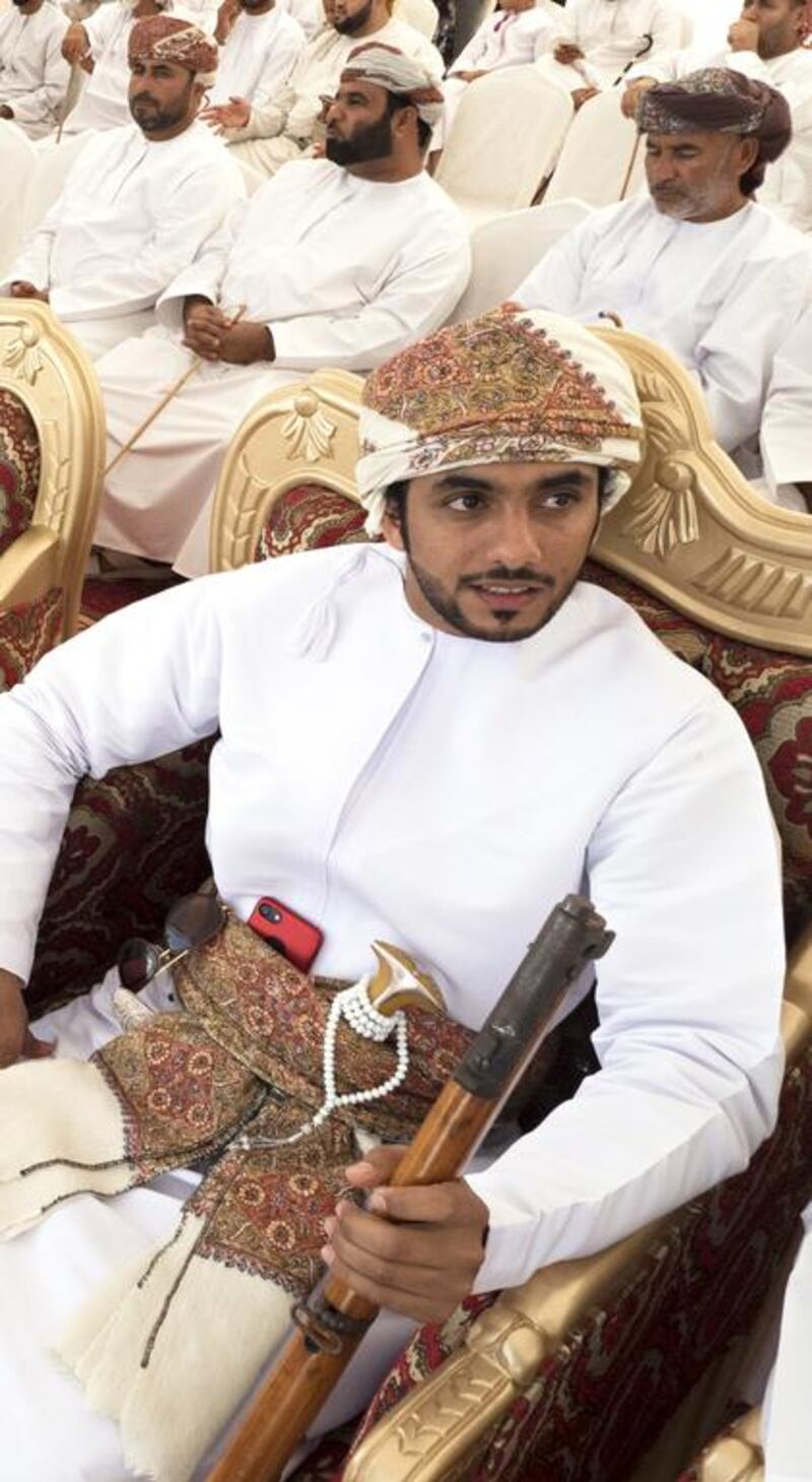 Groom Qais Al Badi celebrates his wedding at the Majaz Festival, an Omani party that features camel and horse racing, dancing and poetry. Jeff Topping for The National