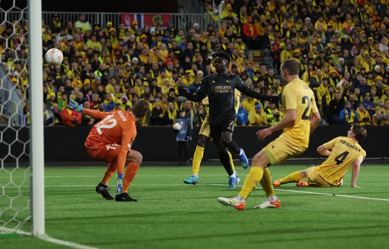 Arsenal's Bukayo Saka scores the first goal. Action Images