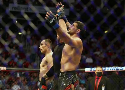 May 15, 2021; Houston, Texas, USA; Beneil Dariush is declared the winner by decision against Tony Ferguson during UFC 262 at Toyota Center. Mandatory Credit: Troy Taormina-USA TODAY Sports