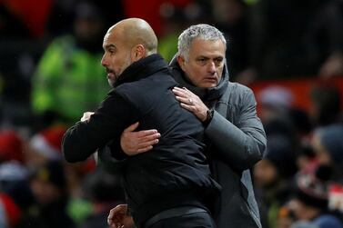 FILE PHOTO: Soccer Football - Premier League - Manchester United vs Manchester City - Old Trafford, Manchester, Britain - December 10, 2017 Manchester City manager Pep Guardiola and Manchester United manager Jose Mourinho at the end of the match Action Images via Reuters/Carl Recine EDITORIAL USE ONLY. No use with unauthorized audio, video, data, fixture lists, club/league logos or "live" services. Online in-match use limited to 75 images, no video emulation. No use in betting, games or single club/league/player publications. Please contact your account representative for further details./File Photo