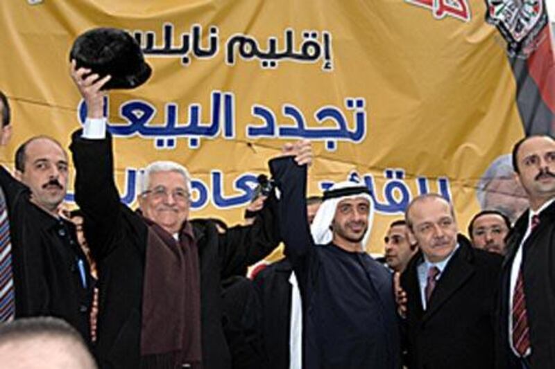Sheikh Abdullah bin Zayed, the Foreign Minister, centre right, takes part in the closing ceremony of the "Al Quds Capital of Arab Culture", alongside Palestine's president Mahmoud Abbas.