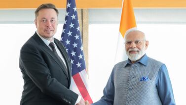 India's Prime Minister Narendra Modi, right, with Tesla chief executive Elon Musk during their meeting in New York last year.  Reuters