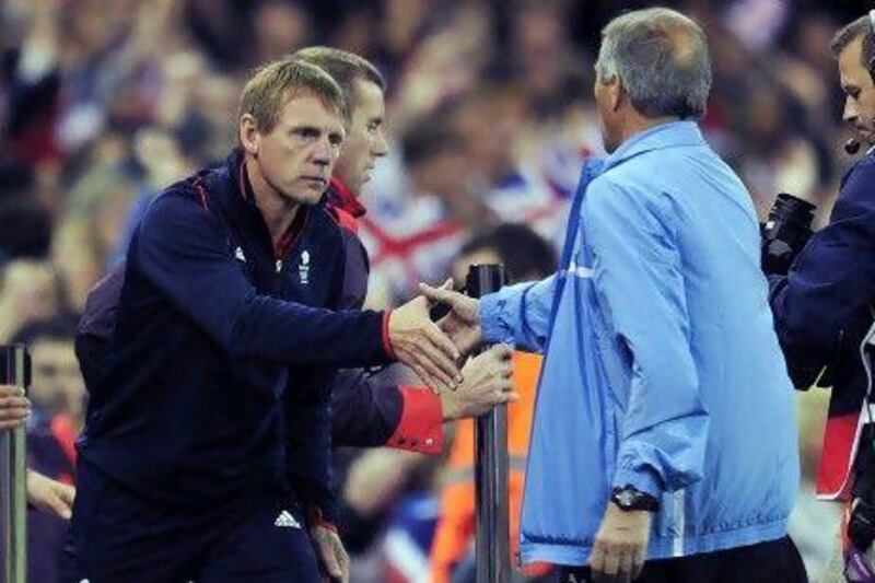Stuart Pearce, left, the Team GB coach, is desperate for a win, more for the players than himself. Glyn Kirk / AFP