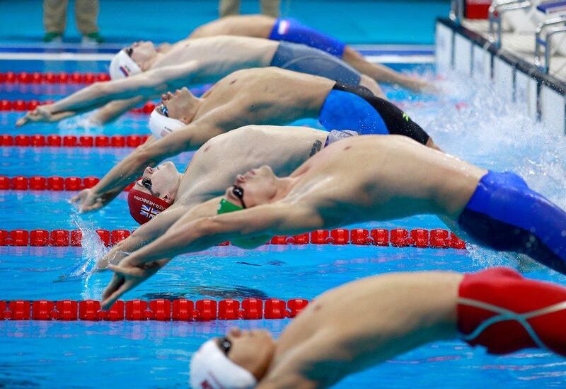 Swimmers compete in the Men's 100m Backstroke heat on Day 2 of the Rio 2016 Olympic Games at the Olympic Aquatics Stadium on August 7, 2016 in Rio de Janeiro, Brazil. (Photo by Adam Pretty/Getty Images)