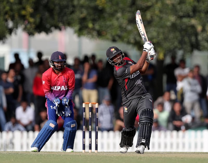 Dubai, United Arab Emirates - January 25, 2019: Amir Hayat of the UAE scores a 6 to win the match in the the game between the UAE and Nepal in a one day internationl. Friday, January 25th, 2019 at ICC, Dubai. Chris Whiteoak/The National