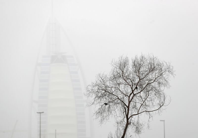 Dubai, United Arab Emirates - Reporter: N/A: Weather. The Burj Al Arab on a dusty and hazy day in Dubai. Sunday, March 29th, 2020. Dubai. Chris Whiteoak / The National