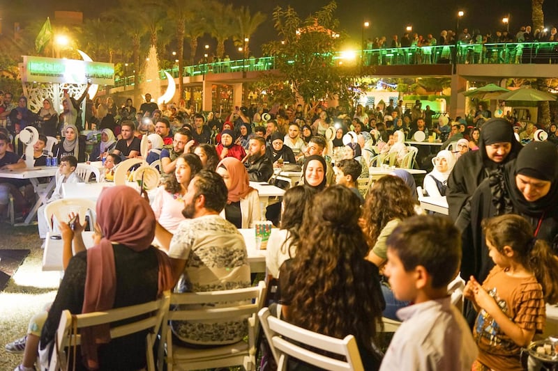 Crowds gather to enjoy music and traditional entertainment at the Ramadan village, Tripoli. Photo: Olivia Cuthbert 