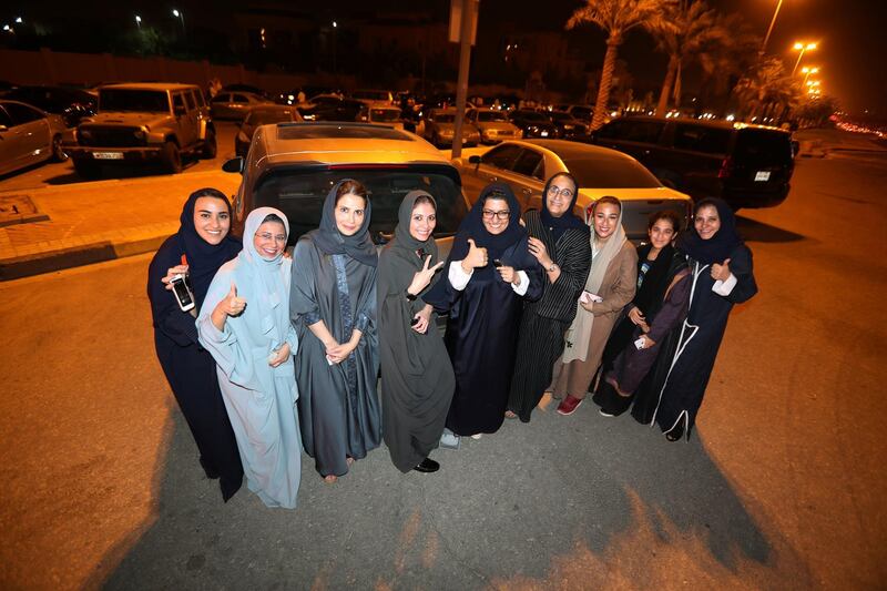 Saudi women celebrate after they drove their cars in Al Khobar, Saudi Arabia, June 24, 2018. Hamad I Mohammed / Reuters