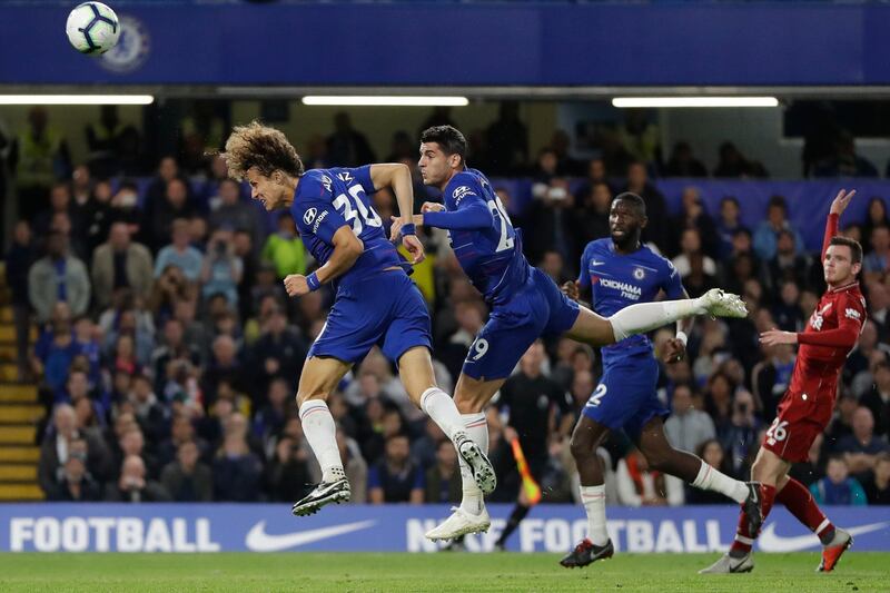 Centre-back: David Luiz (Chelsea) – The Brazilian made a goal-line clearance, passed the ball superbly and looked a class act in an impressive display against Liverpool. AP Photo