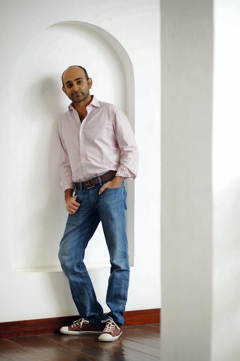 DOHA, QATAR - NOVEMBER 18:  Writer Mohsin Hamid of  "The Reluctant Fundamentalis" poses for a portrait during the 2012 Doha Tribeca Film Festival at AL Najada Hotel on November 18, 2012 in Doha, Qatar.  (Photo by Andrew H. Walker/Getty Images for Doha Film Institute)