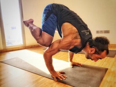 CrossFit coach Ahmed Eid doing yoga. Courtesy Margie Cordon