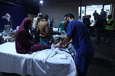 Wounded Palestinians receive treatment at a hospital in the Rafah refugee camp, in the southern Gaza Strip on Tuesday. AFP
