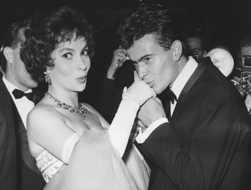 German actor Horst Buchholz with Lollobrigida at the Berlin International Film Festival in 1958. AP