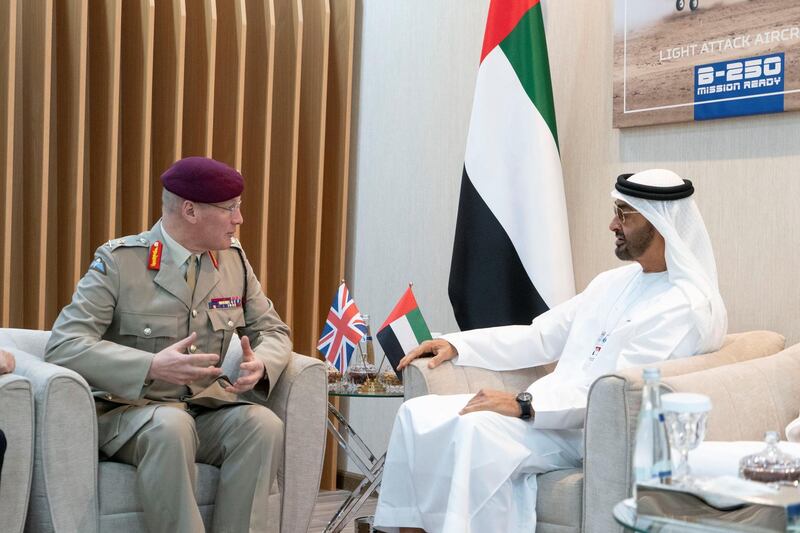 ABU DHABI, UNITED ARAB EMIRATES - February 18, 2019: HH Sheikh Mohamed bin Zayed Al Nahyan, Crown Prince of Abu Dhabi and Deputy Supreme Commander of the UAE Armed Forces (R) meets with Lieutenant General Sir John Lorimer, UK’s Defence Senior Advisor to the Middle East (L), during the 2019 International Defence Exhibition and Conference (IDEX), at Abu Dhabi National Exhibition Centre (ADNEC).
( Rashed Al Mansoori / Ministry of Presidential Affairs )
---