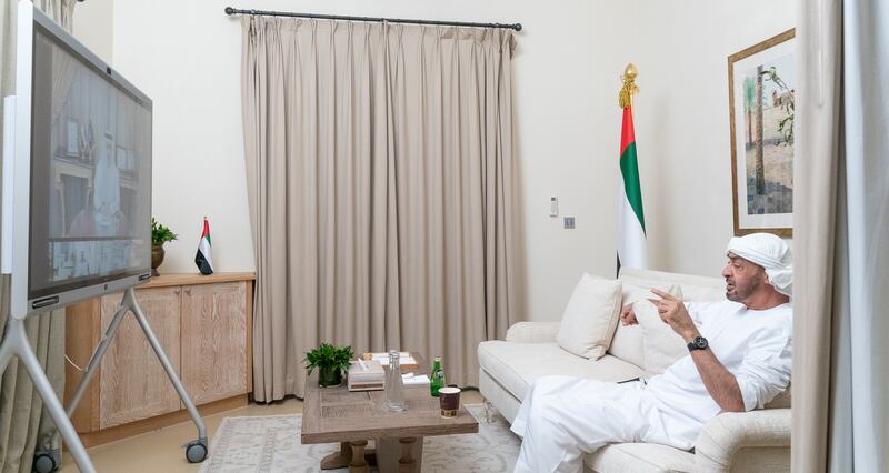 ABU DHABI, UNITED ARAB EMIRATES - March 29, 2020: HH Sheikh Mohamed bin Zayed Al Nahyan, Crown Prince of Abu Dhabi and Deputy Supreme Commander of the UAE Armed Forces (R), receives a briefing via video conference on the latest national efforts to combat Covid-19.

( Rashed Al Mansoori / Ministry of Presidential Affairs )
---