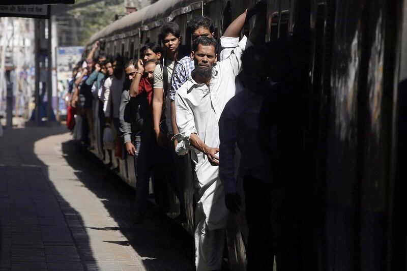 Indian Railways runs 19,000 trains a day, of which 12,000 carry more than 23 million passengers and 7,000 carry 3 million tonnes of freight. Rajanish Kakade / AP Photo