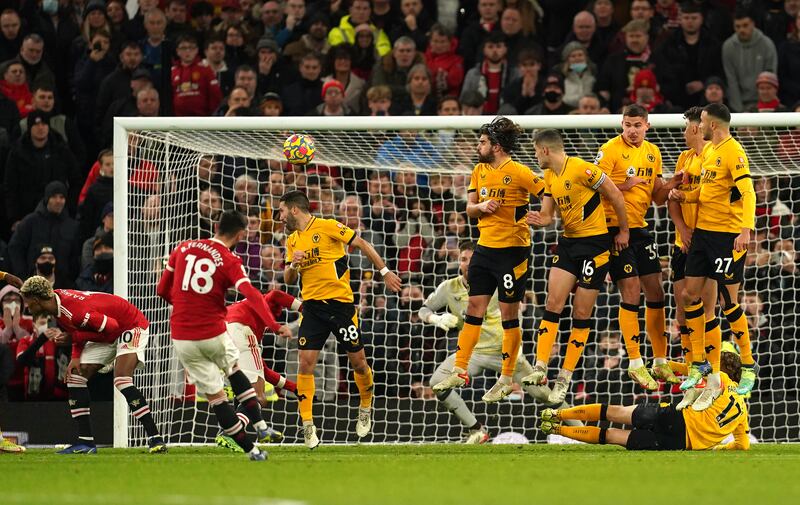 United's Bruno Fernandes takes a free-kick deep in injury-time that was saved by Wolves goalkeeper Jose Sa. PA
