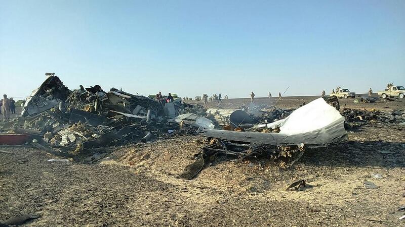 Debris from crashed the Russian jet lies strewn across the sand at the site of the crash in Sinai, Egypt. International investigators have begun probing why a Russian airliner carrying 224 people crashed in a mountainous area of Egypt’s Sinai Peninsula.  EPA