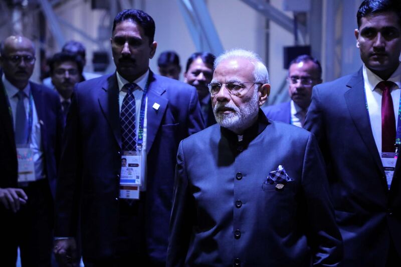 India's Prime Minister Narendra Modi (C) arrives for a bilateral meeting on the second day of the G20 Leaders' Summit in Buenos Aires, on December 01, 2018.  The leaders of countries representing four-fifths of the global economy opened a two-day meeting in Argentina facing the deepest fractures since the first G20 summit convened 10 years ago in the throes of financial crisis. / AFP / Ludovic MARIN
